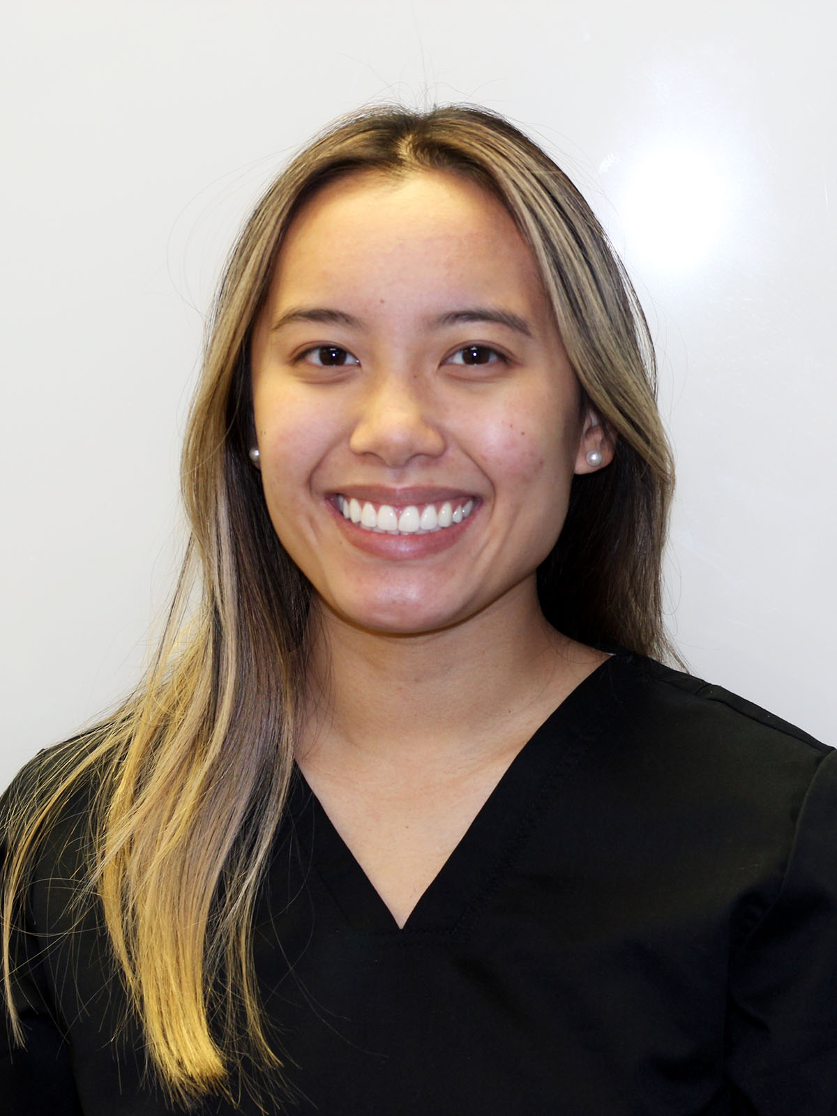 Jolynn Dangtran dental assistant smiling headshot