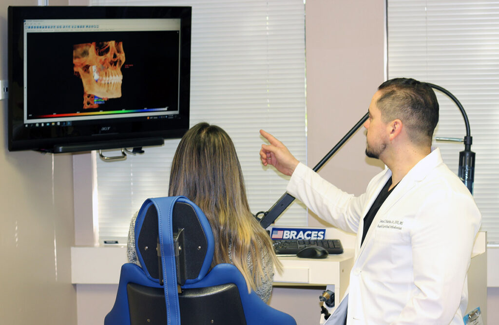 Doctor explaining to the patient about teeth